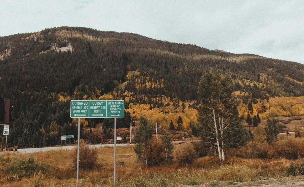 Road signs along the Million Dollar Highway in Durango, Colorado